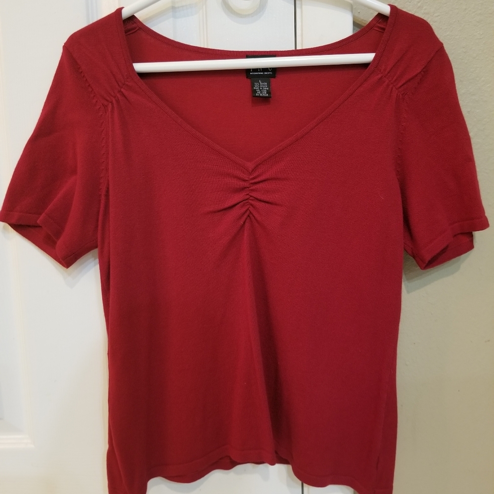 Red INC shirt